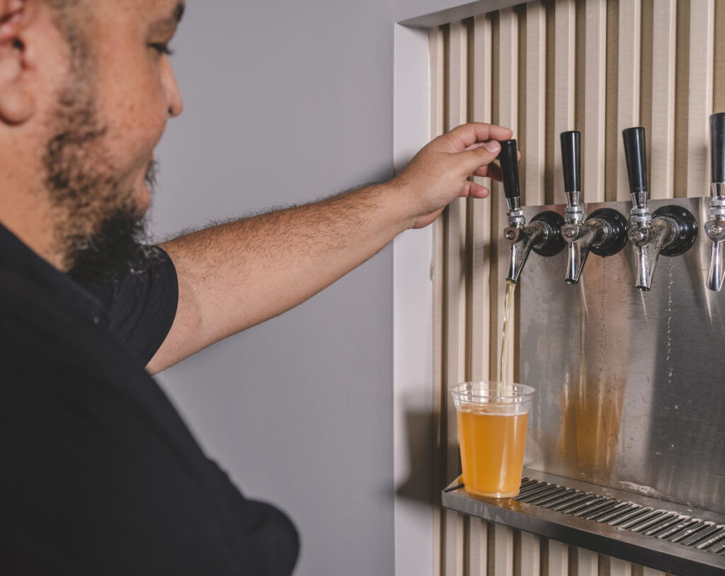 Pouring fresh draft beer at Snake island Brewing Co. Taproom